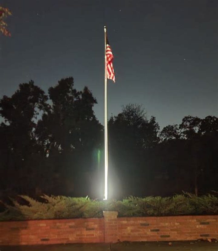 Can you display an American flag at night?