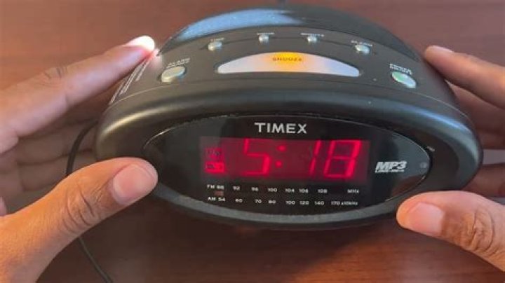 How do you change the time on a Timex Nature Sounds Clock?