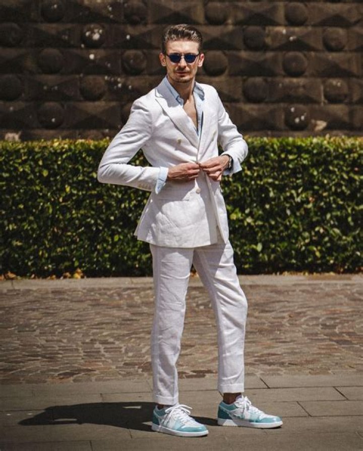 How do you style suits with sneakers?