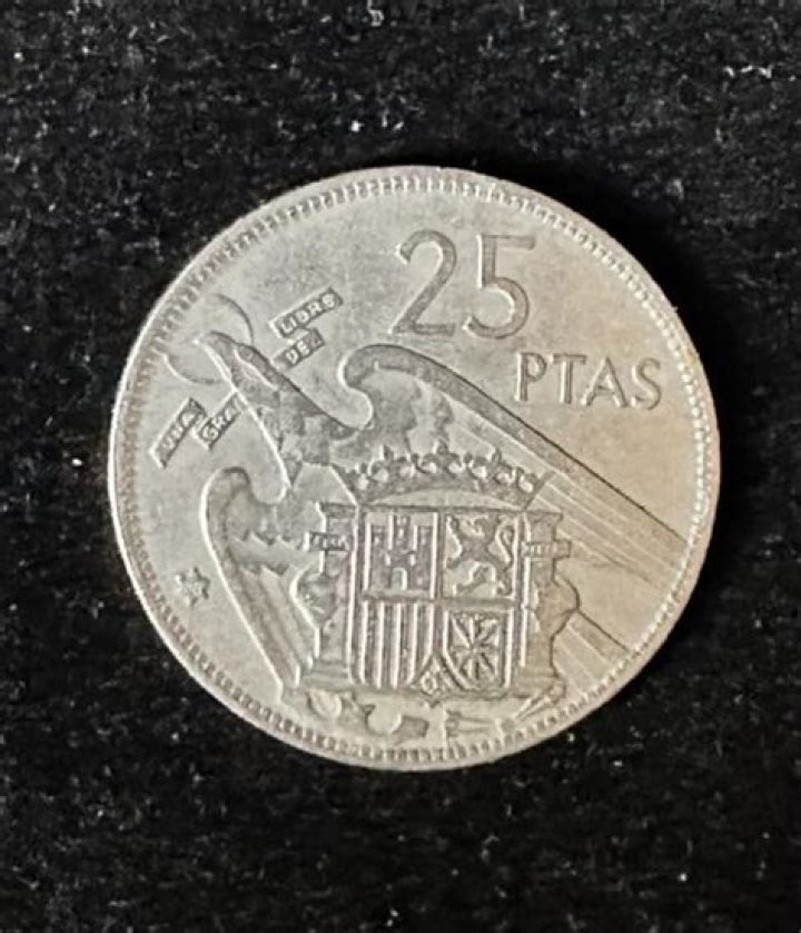 How much is a 1975 25 PTAS coin worth?