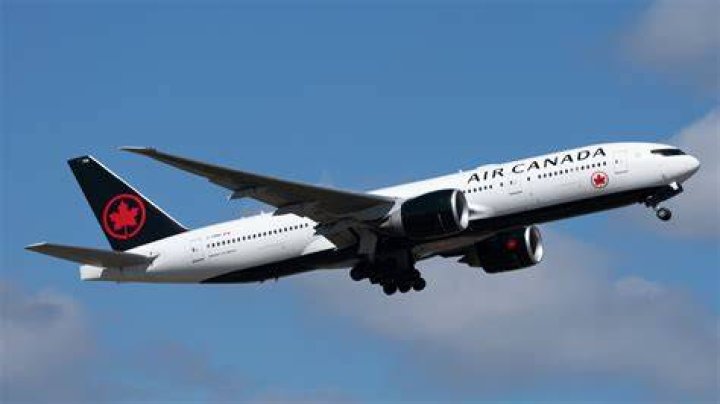 Where do most international flights land in Canada?