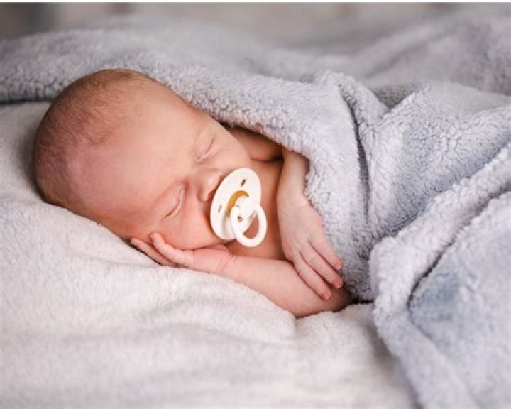 Where should pacifier clips be placed?