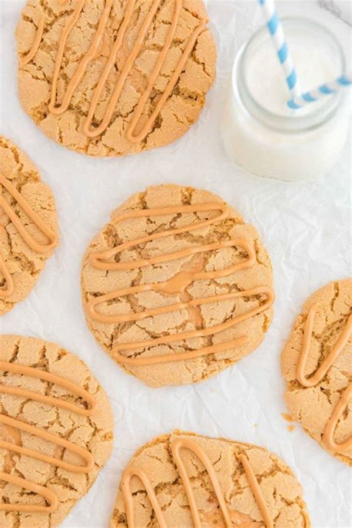 Why do you press a fork into peanut butter cookies?